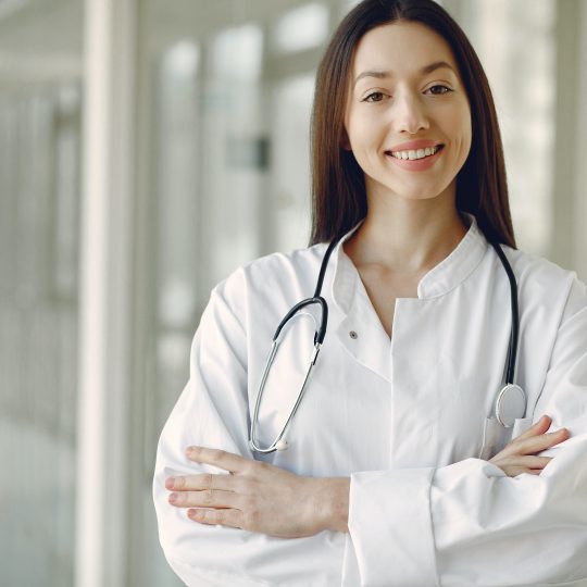 crop-doctor-in-medical-uniform-with-stethoscope-standing-in-4173251